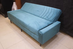Sofa Cum Bed Upholstered in Premium Velvet Fabric With An Easy Pull-out Mechanism.