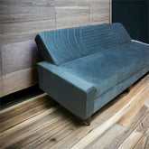 Sofa Cum Bed Upholstered in Premium Velvet Fabric With An Easy Pull-out Mechanism.