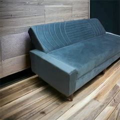 Sofa Cum Bed Upholstered in Premium Velvet Fabric With An Easy Pull-out Mechanism.