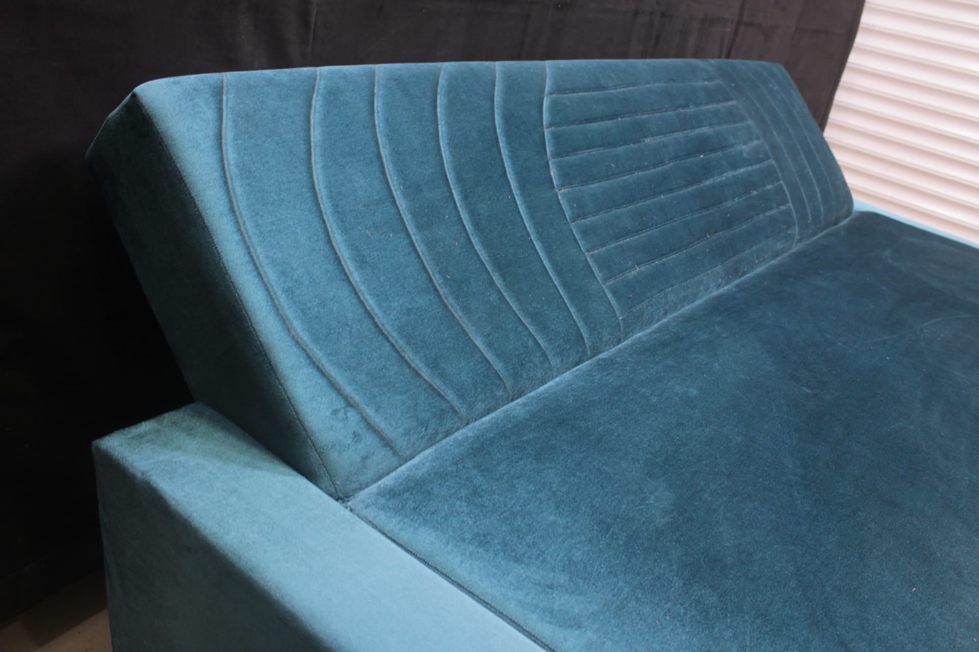 Sofa Cum Bed Upholstered in Premium Velvet Fabric With An Easy Pull-out Mechanism.