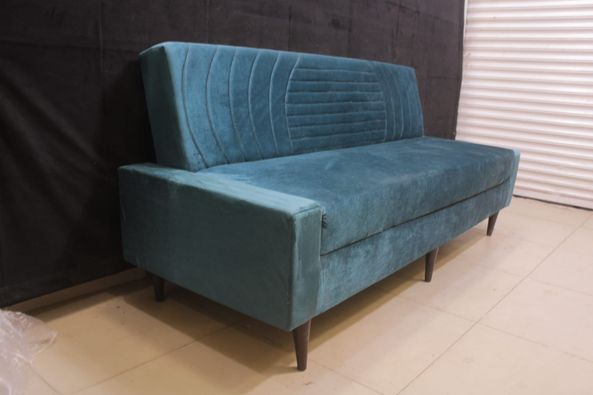 Sofa Cum Bed Upholstered in Premium Velvet Fabric With An Easy Pull-out Mechanism.