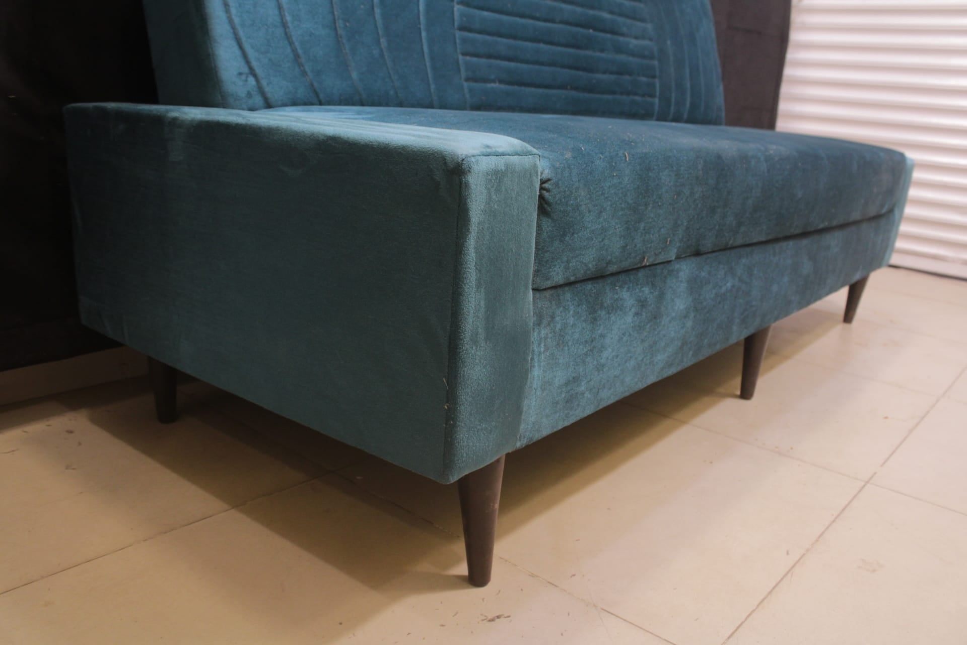 Sofa Cum Bed Upholstered in Premium Velvet Fabric With An Easy Pull-out Mechanism.