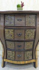 IMPORTED Antique Anglo-Indian rattan and pressed brass bombe bedside chest with four drawers.