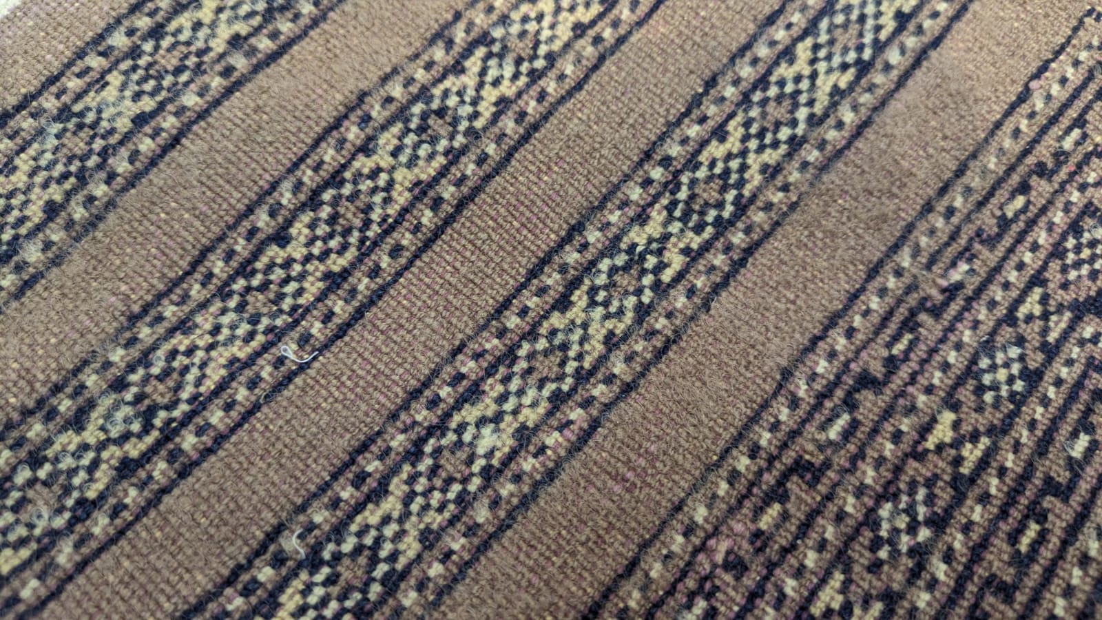 Vintage Hand-Knotted Bokhara Tribal Wool Carpet.