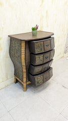 IMPORTED Antique Anglo-Indian rattan and pressed brass bombe bedside chest with four drawers.