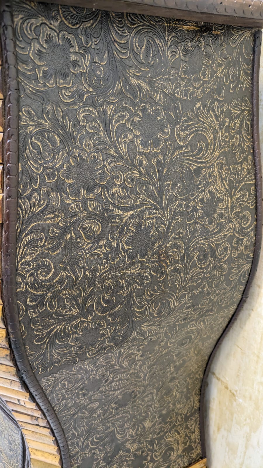 IMPORTED Antique Anglo-Indian rattan and pressed brass bombe bedside chest with four drawers.