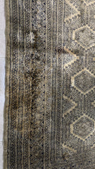 Vintage Hand-Knotted Bokhara Tribal Wool Carpet.